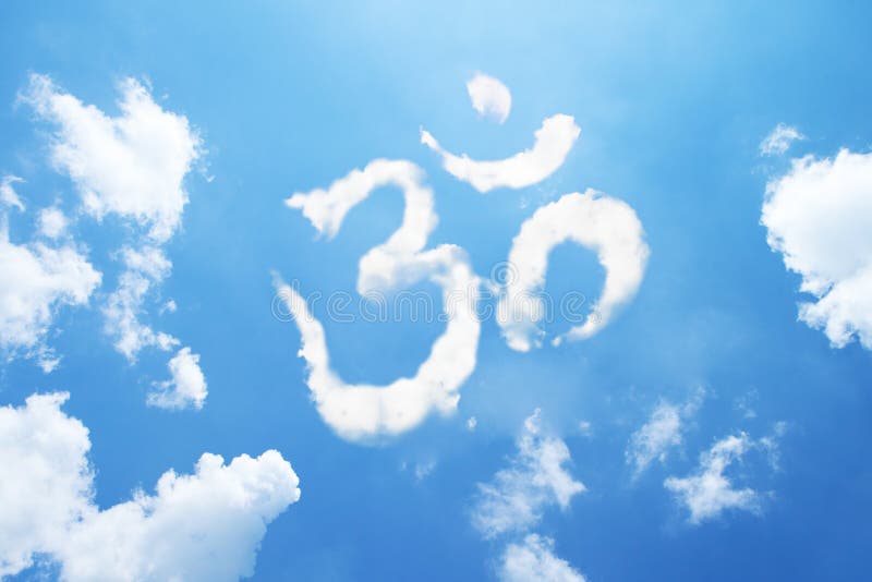 Om symbol clouds shaped on blue bright sky. Om symbol clouds shaped on blue bright sky.