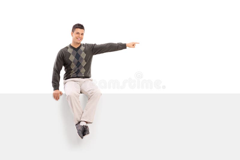 Om stând pe un panou și arătând cu mâna stock photos