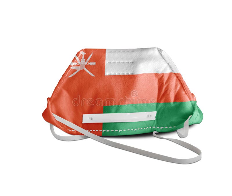 Oman flag on anti pollution mask medical protection stock images