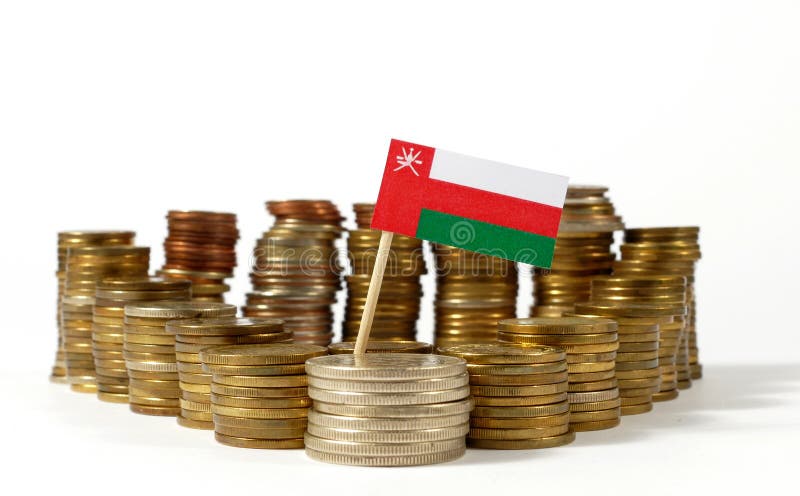 Oman flag with stack of money coins stock photo