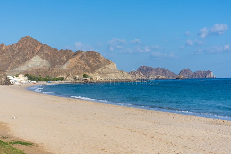 Oman kust: Berg strand, blått vatten arkivfoto Oman kust: Berg strand, blått vatten arkivfoto