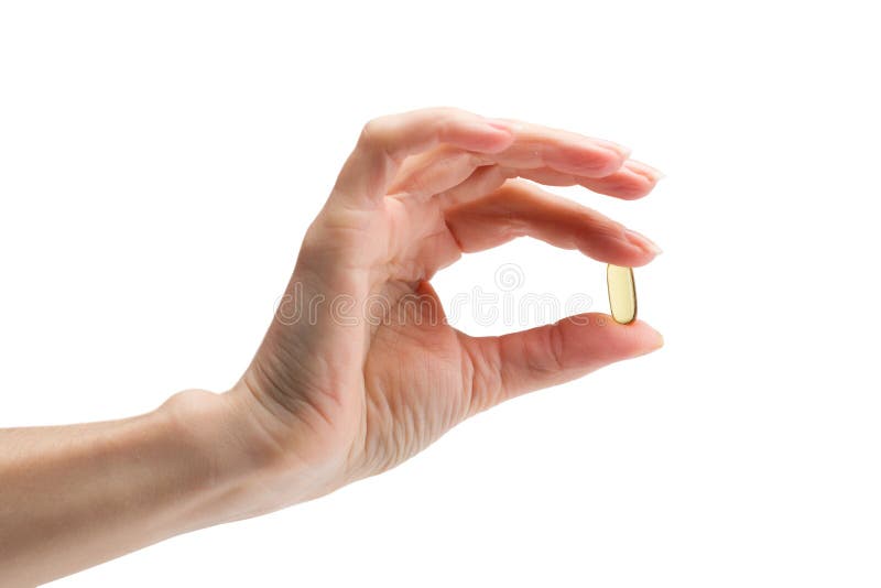 Omega 3 i kvinnliga fingrar fotografering för bildbyråer Omega 3 i kvinnliga fingrar fotografering för bildbyråer