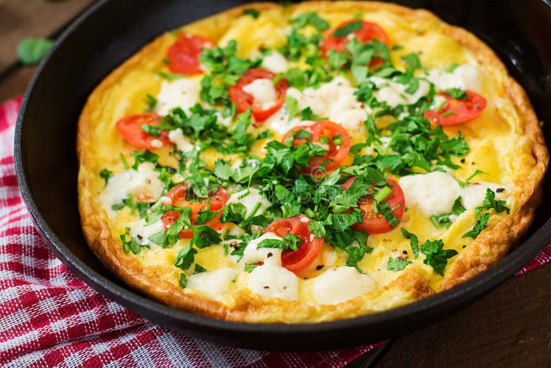 Omelet With Tomatoes, Parsley And Feta Cheese Stock Photo - Image of ...