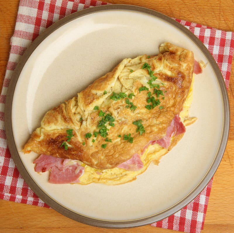 Omelett Mit Schinken U. Käse Stockbild - Bild von schinken, petersilie ...