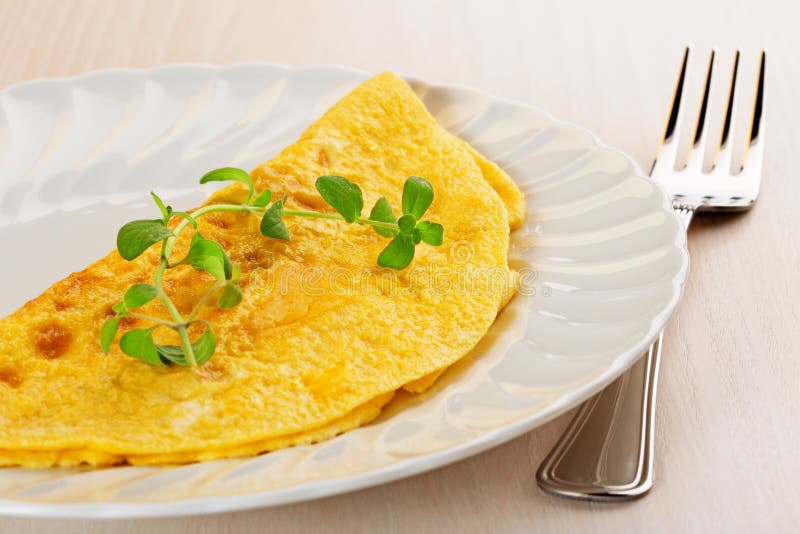 Omelette garnished with marjoram