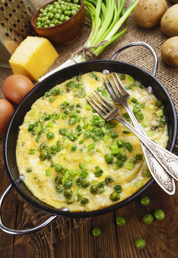 Omelette with Green Peas, Potatoes and Cheese Stock Image Image of