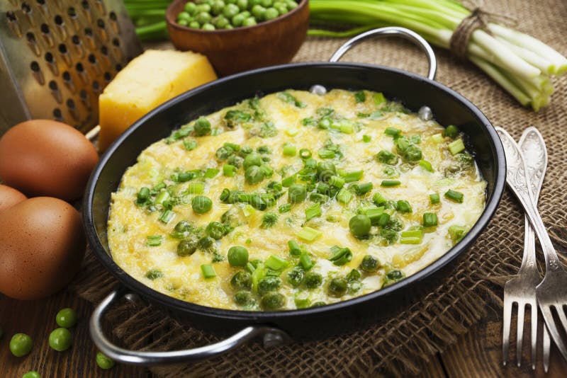Omelette with Green Peas, Potatoes and Cheese Stock Image Image of