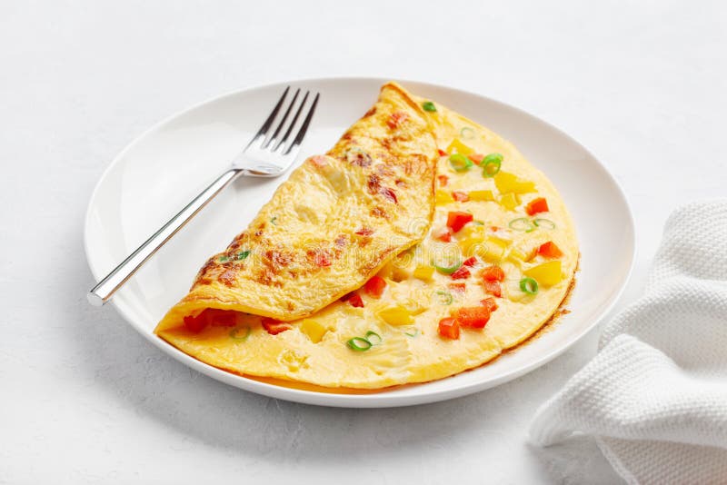 Omelette with Tomato, Bell Pepper Onion and Cheese. Healthy Breakfast