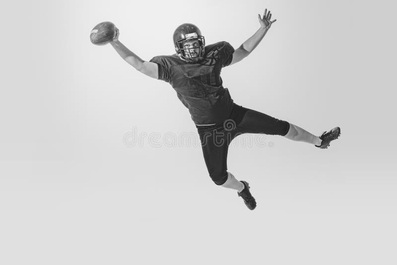 One American Football Player Wearing Retro Stlye Sports Uniform in Action  and Motion Isolated on White Background Stock Image - Image of competitive,  white: 253264779