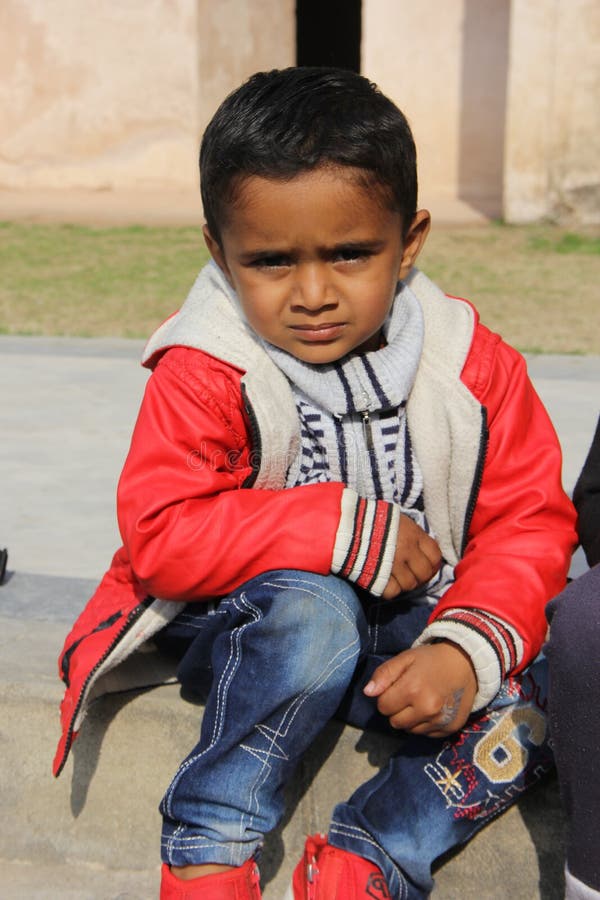 One Asian Pakistani Cute Kid Wears a Hot Dress in the Winter Season and ...