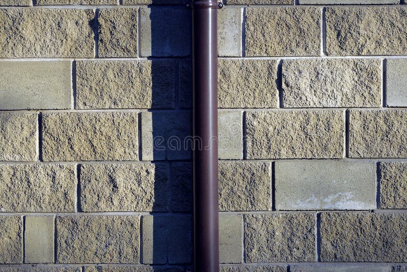 Gas pipe in a brick wall stock image. Image of home 190845461