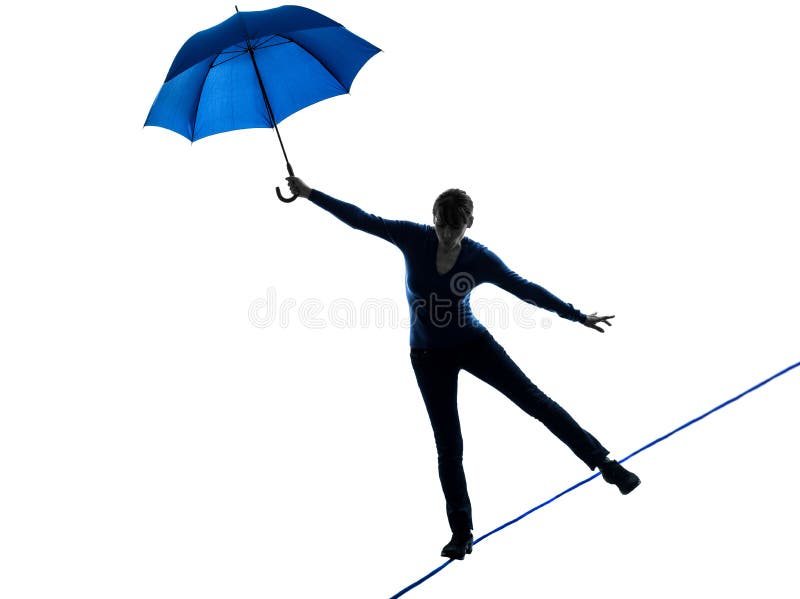 Woman holding umbrella silhouette