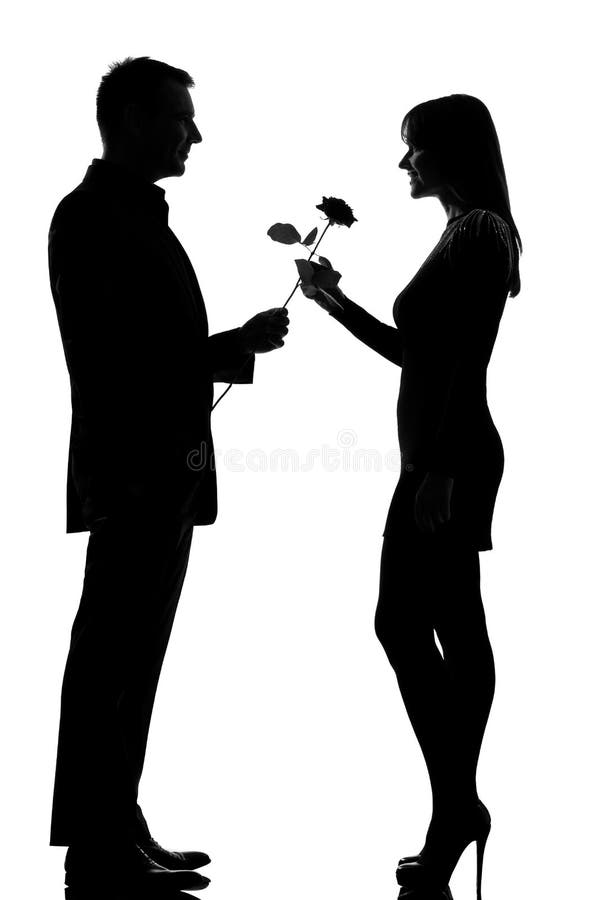 One couple man offering rose flower and woman