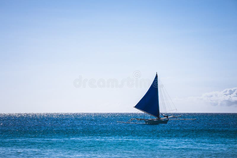 One Double Outrigger Sailboat on the Sea Editorial Photography Image One Double Outrigger Sailboat on the Sea Editorial Photography Image