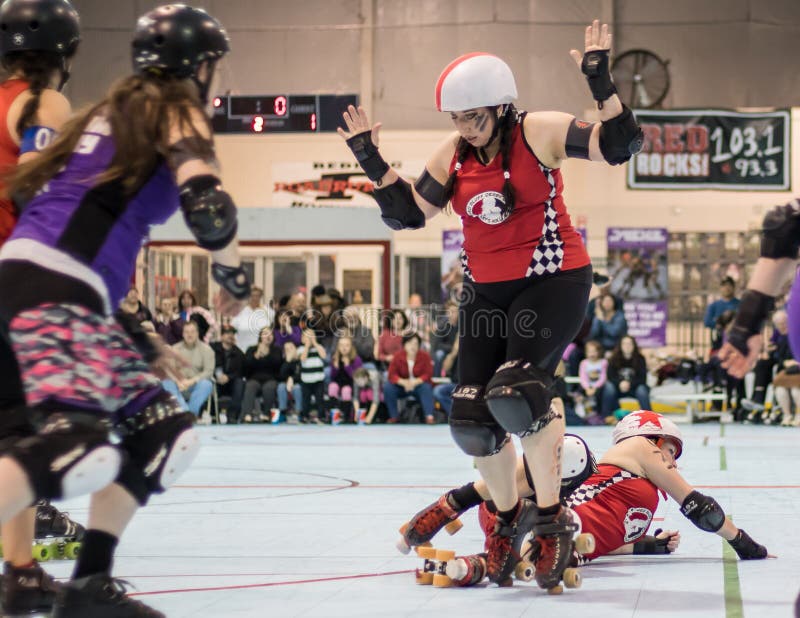 Redding, California:Skaters from the Red Bluff Derby Girls team and Shasta Roller Derby in action in a bout in northern California. Redding, California:Skaters from the Red Bluff Derby Girls team and Shasta Roller Derby in action in a bout in northern California.