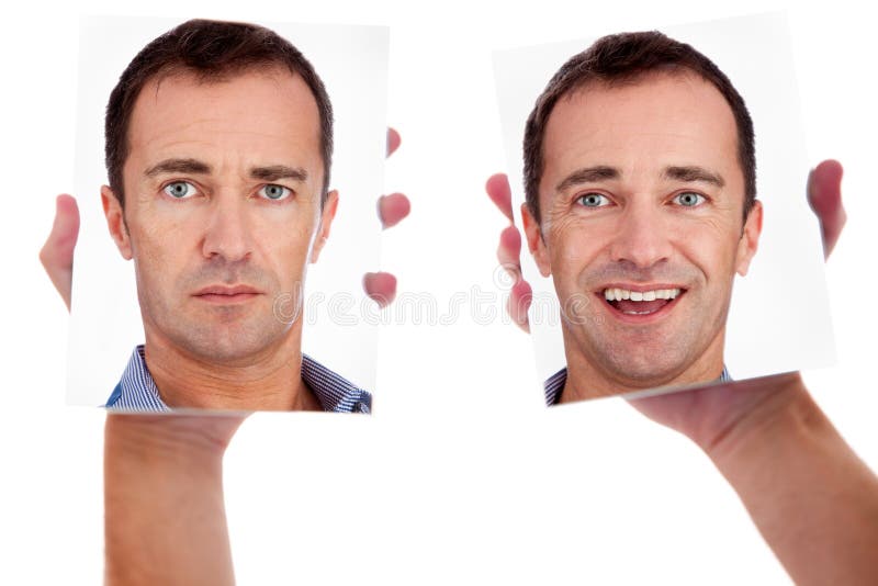 One man, with two faces on the mirror, isolated on white, studio shot