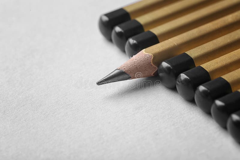 One pencil standing out from others royalty free stock photo One pencil standing out from others royalty free stock photo