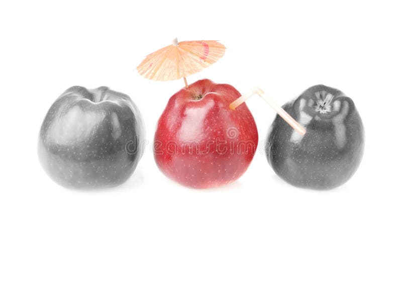 One red apples and two colourless apples royalty free stock image