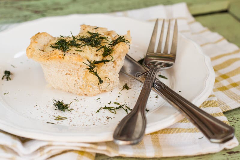 One Serving of Bread Pudding with a Liquid Egg in the Context of Stock