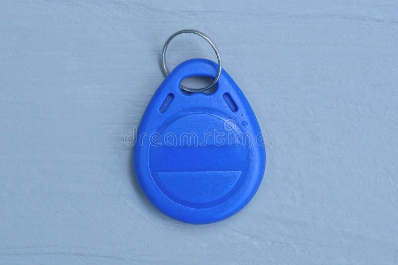 One small blue plastic electronic key for intercom stock photos