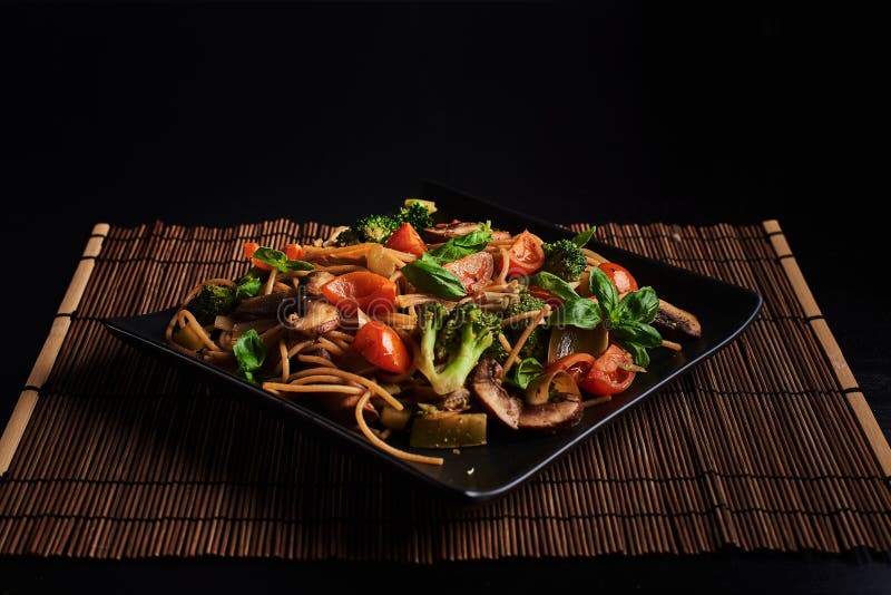 One Square Plate with Italian Vegan Integral Pasta with Broccoli