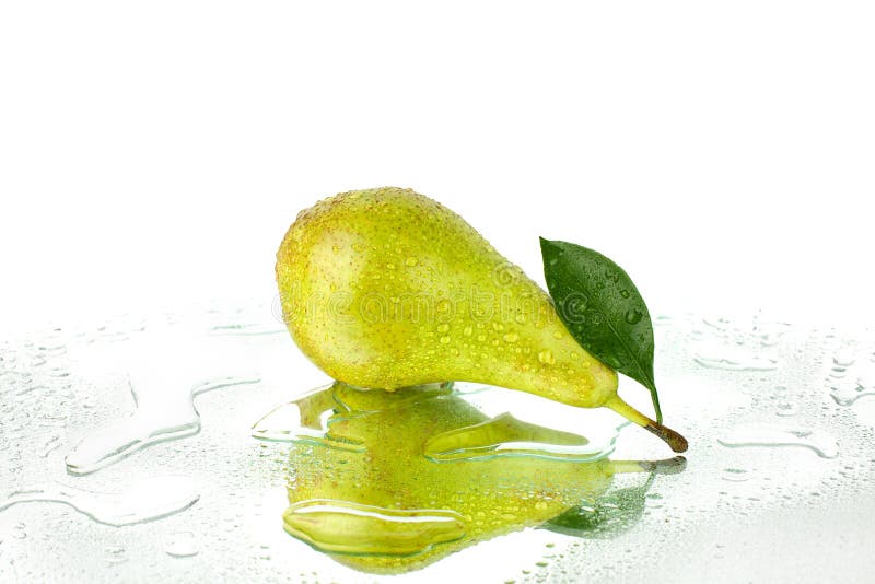 Conference pear with green leaves on white background isolated close up