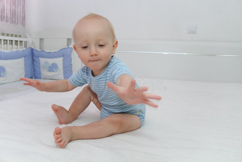 One Year Baby Boy Playing in the Bed Stock Photo Image of