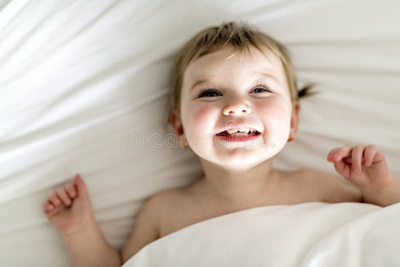 7 Years Old Girl with Kitten at Home Bed Stock Photo Image of