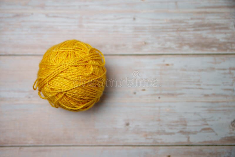 One yellow ball of thread stock photography One yellow ball of thread stock photography