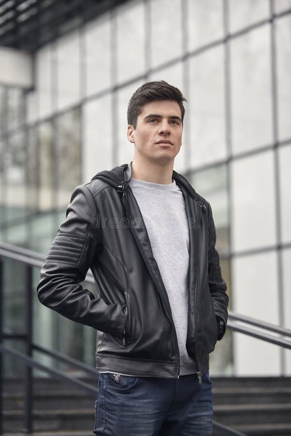 One Young Handsome Man Posing Outdoors, Wearing Jacket, Talking Over ...