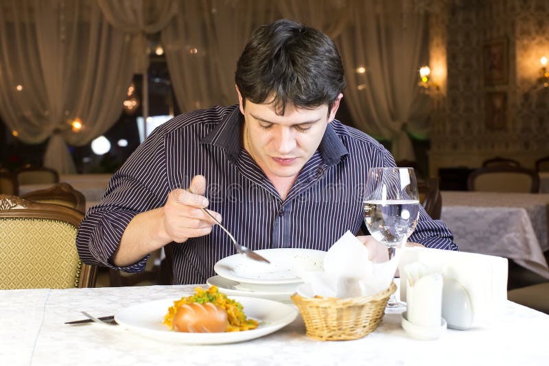 One young man dines. White, birthday.