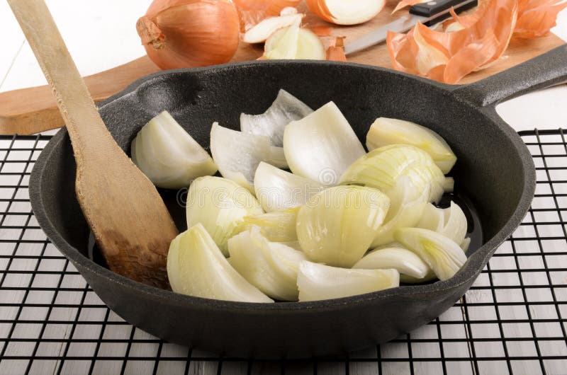 Onion Chunks with Sunflower Oil in a Cast Iron Pan Stock Photo Image