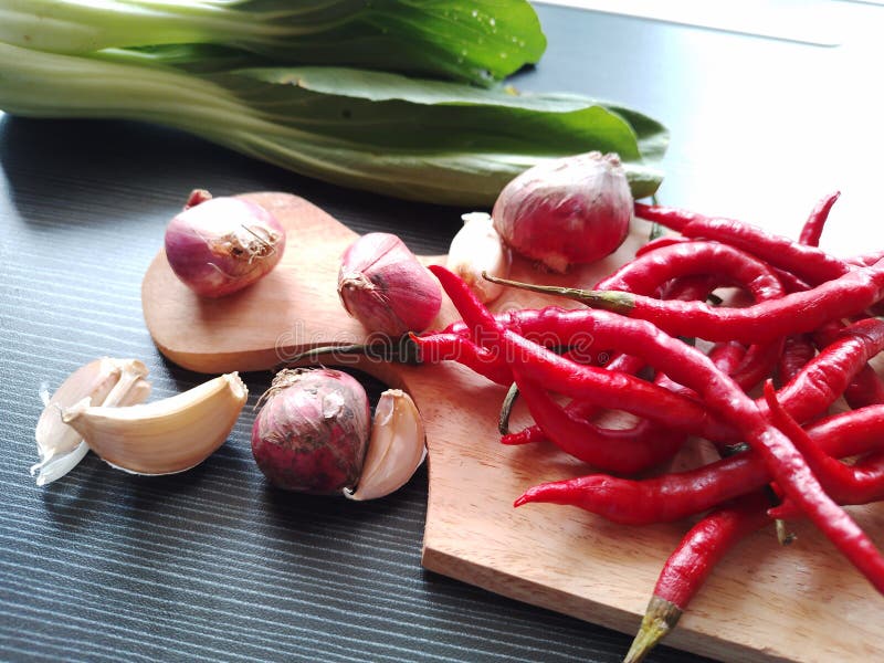 Onion, Garlic, Chili Pepper, Bok Choy Stock Photo Image of cooking, board 258775034