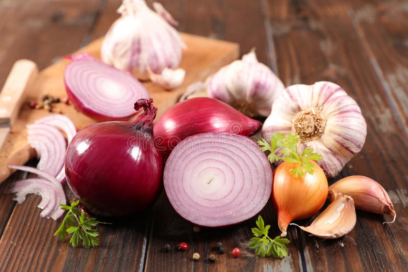 Premium Photo  A sack of garlics shallots and onions