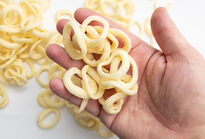 Onion ring chips in hand. stock photo. Image of beer 270123368
