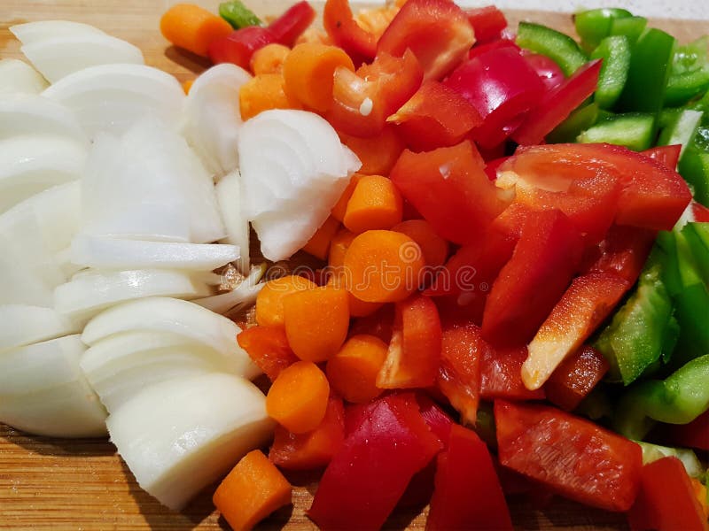 Onions, Carrots and Tomatoes on the Chopping Block Stock Image Image