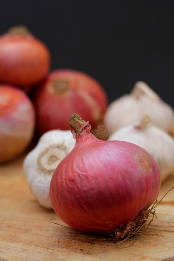 Onions and garlic stock photo. Image of bulbil, wooden 33464134