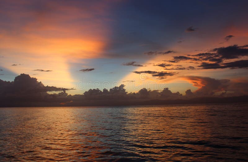 Lake Izabal also known as the Golfo Dulce, is the largest lake in Guatemala with a surface area of 589.6 km². Maximum depth is 18 m (59 ft). The Polochic River is the largest river that drains into the lake. The lake, which is only a metre above sea level, drains into the Gulf of Honduras of the Caribbean Sea through the smaller Golfete Dulce, which is at sea level, and the navigable Rio Dulce. Magical colours in the sky created by an amazing sunset. Lake Izabal also known as the Golfo Dulce, is the largest lake in Guatemala with a surface area of 589.6 km². Maximum depth is 18 m (59 ft). The Polochic River is the largest river that drains into the lake. The lake, which is only a metre above sea level, drains into the Gulf of Honduras of the Caribbean Sea through the smaller Golfete Dulce, which is at sea level, and the navigable Rio Dulce. Magical colours in the sky created by an amazing sunset.