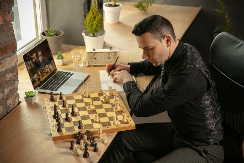 Blonde Woman Playing Chess Online Uses Laptop, Thoughtfully Makes