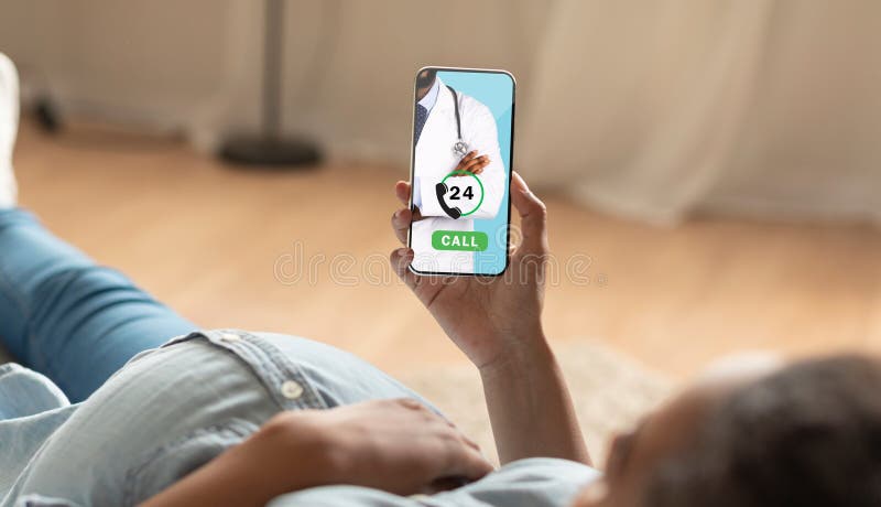 Online Consultation. Pregnant Woman Calling Doctor On Smartphone stock photo