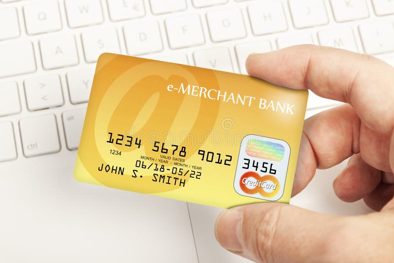 Online Credit Card Payment - Hand Holding Credit Card Above a Keyboard Stock Photo - Image of name, internet: 186883866