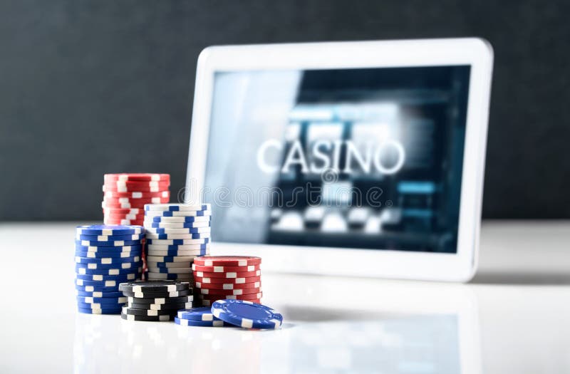 Online Gambling on Mobile Casino Concept. Stack of Poker Chips and Tablet  with Slot Machine on Screen. Betting on Internet. Stock Image - Image of  gambler, mock: 158418861