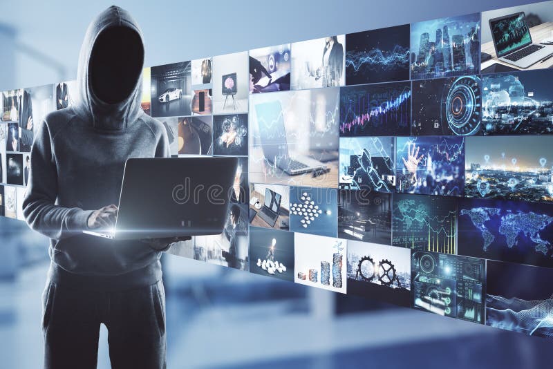 Online piracy concept with noface hacker with laptop on media wall royalty free stock image
