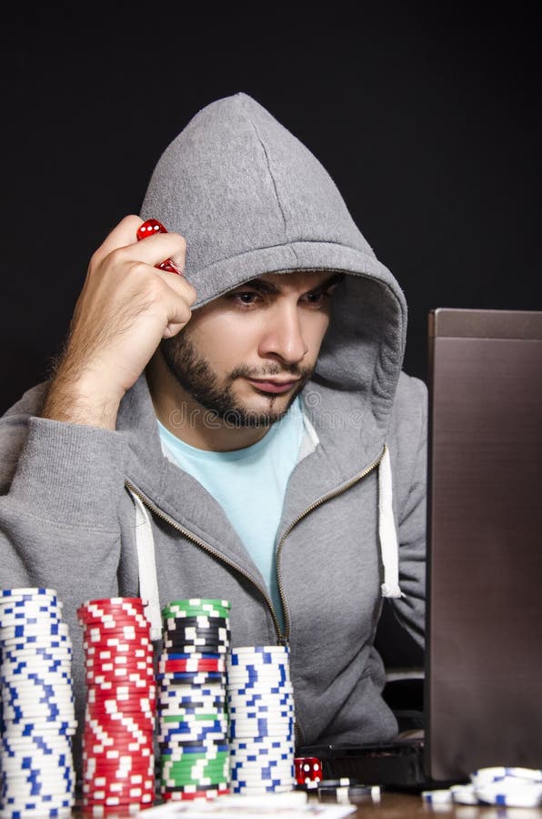 Online-pokerspelare fotografering för bildbyråer Online-pokerspelare fotografering för bildbyråer