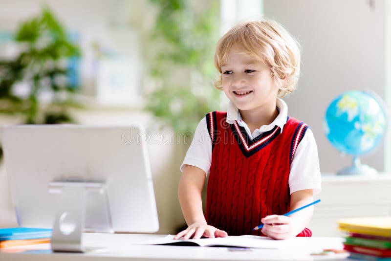 Online remote learning. School kids with computer royalty free stock photos