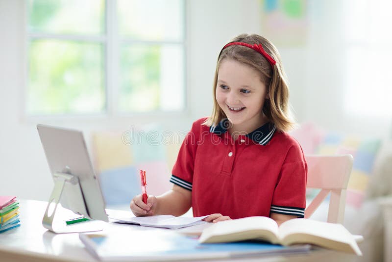 Online remote learning. School kids with computer royalty free stock photos