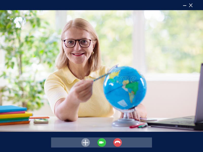 Online remote learning. Teacher with computer stock photography