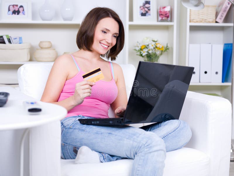 Online shopping for young woman stock image