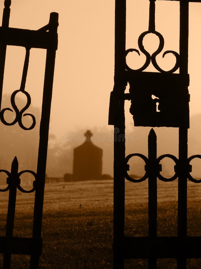 Closeup of the open gates to the old cemetary. Closeup of the open gates to the old cemetary