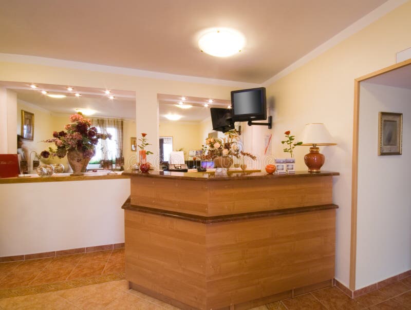 The interior of a small, private guests house, reception desk in the middle. The interior of a small, private guests house, reception desk in the middle.